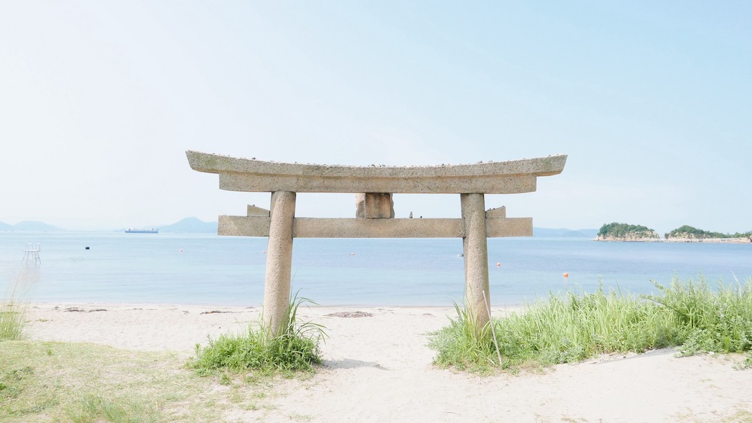 Torii gate on a beach